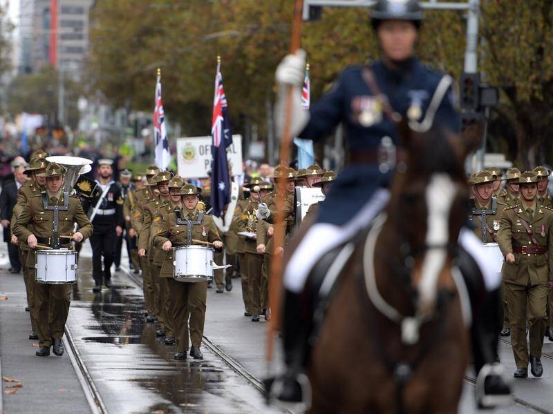 This year's Anzac Day parade in Melbourne is back on and will be "as close to normal as possible".