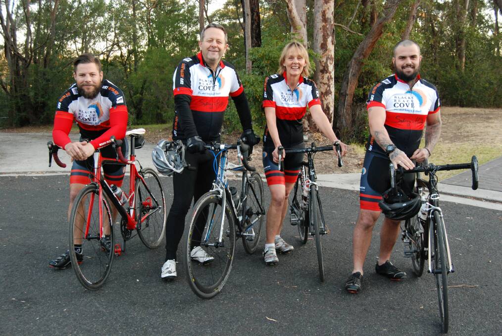 Megan Watson with husband Ken (centre) and riders Ben Carney (left) and Justin Hawthorne (right) who are riding to raise funds for Yarramundi-based charity One80tc. Photo: Shane Desiatnik
