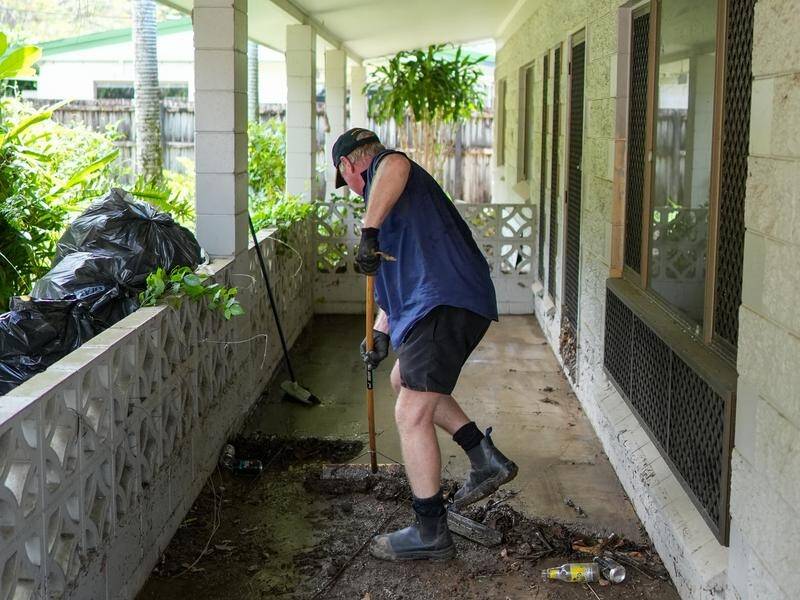 Just as north Queensland's recovery gathers momentum, the threat of another cyclone looms. (Nuno Avendano/AAP PHOTOS)