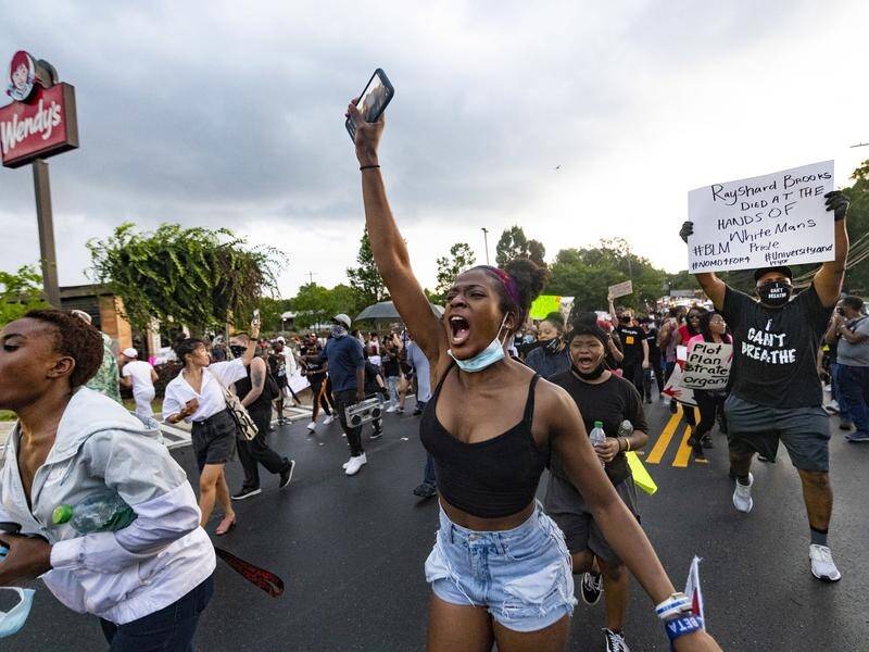 Protesters in Atlanta demand action over the police shooting of Rayshard Brooks.