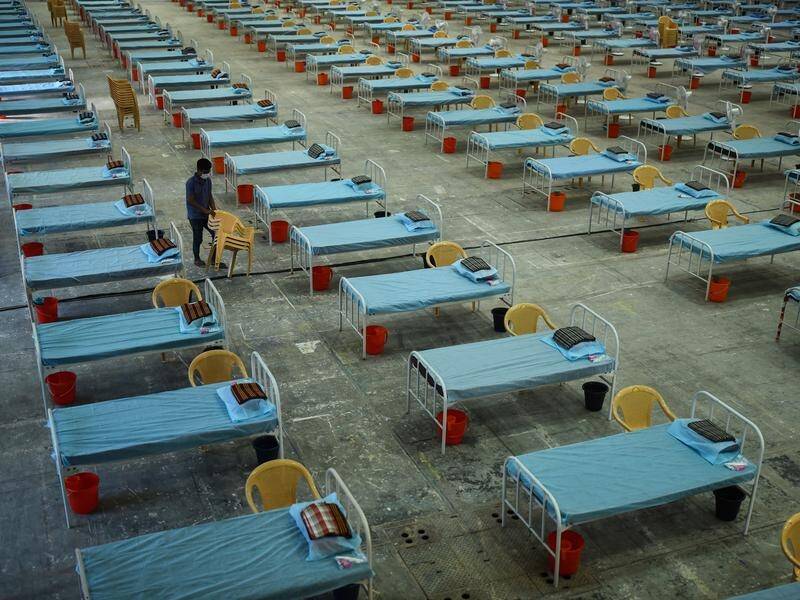 Beds at a COVID-19 care facility in Chennai, India, stand ready as an Omicron surge takes hold.