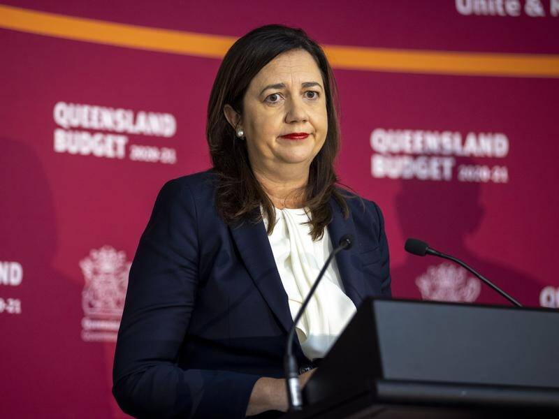 Annastacia Palaszczuk denies she has broken an election promise by borrowing more than she pledged.