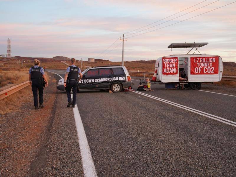 Protesters blocked access to Woodside's Burrup Hub after a go-ahead for its Scarborough gas project.