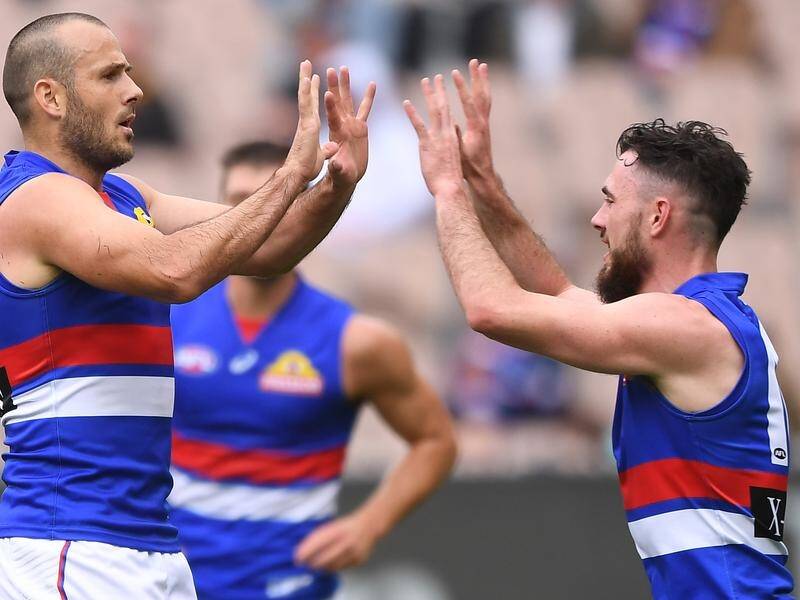 The resurgence of Tory Dickson (left) at the Bulldogs has been mirrored by his AFL team.