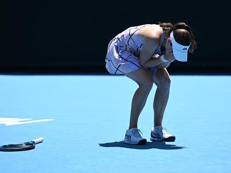Aussie wildcard Kimberly Birrell is overcome by emotion after a thrilling win at Melbourne Park. (Lukas Coch/AAP PHOTOS)