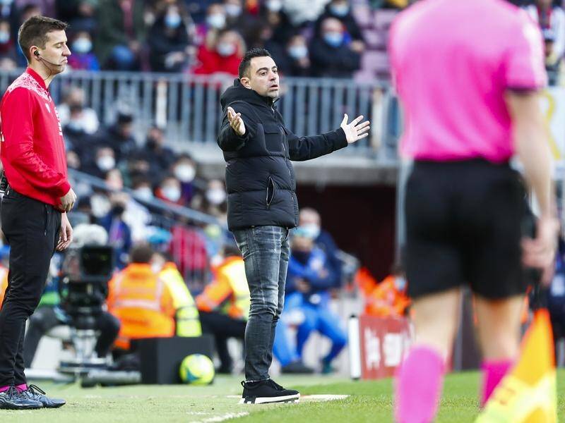 Head coach Xavi looks exasperated as his Barcelona side were defeated by Real Betis.