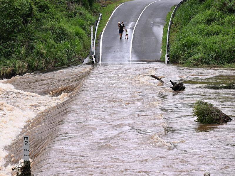 Springfield Lakes, west of Brisbane, received 130mm of rain in three hours on Tuesday. (Dave Hunt/AAP PHOTOS)