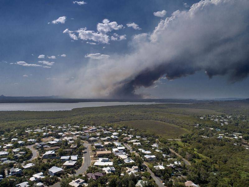 Thousands of Queensland residents have been evacuated in as bushfires continue to burn.