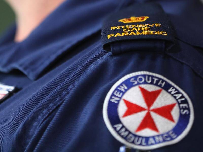 The NSW government's pay offer to ambulance workers has been described as pathetic and humiliating .