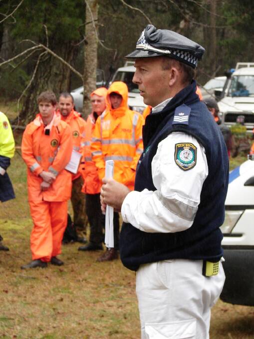 Sergeant Ian Colless at the command post in Wentworth Falls during the search for Jamie Neale in 2009. Photo: Top Notch Video