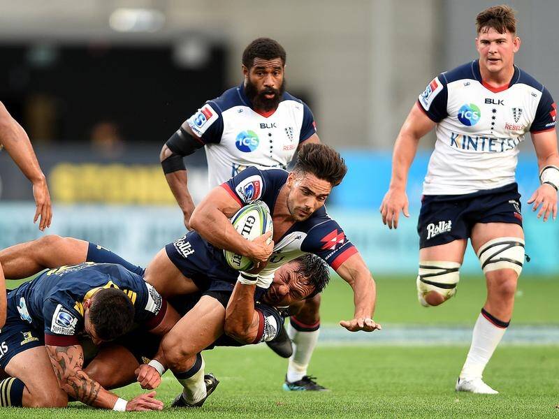 The Melbourne Rebels have scored their first Super Rugby win in Dunedin, beating the Highlanders.