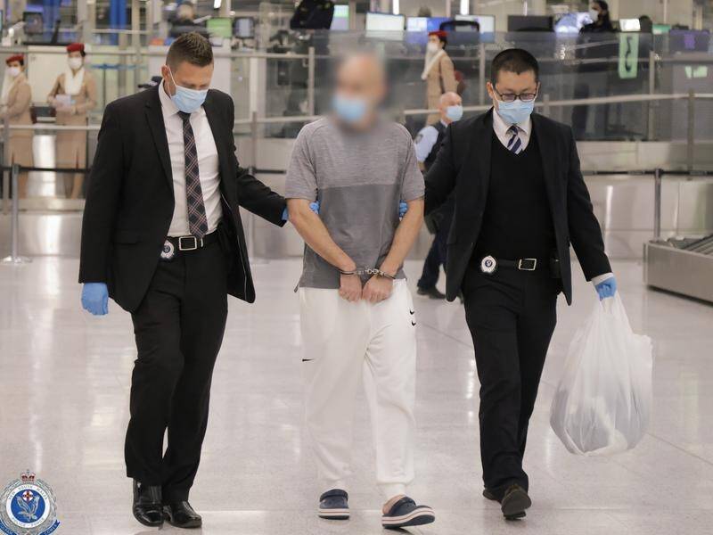 The men were extradited from Dubai, landing at Sydney International Airport on Wednesday.
