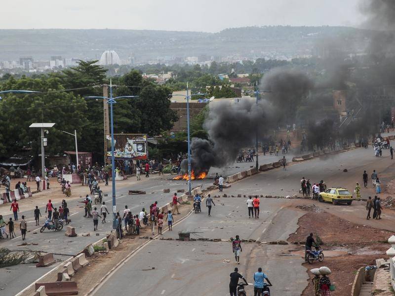 Anti-government protesters in Mali have burned tyres and barricaded roads in the capital Bamako.
