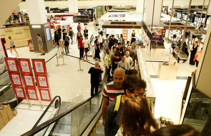 Shoppers in the Myer department store for the Boxing Day sales in Sydney. Photo: AAP Image/Paul Braven