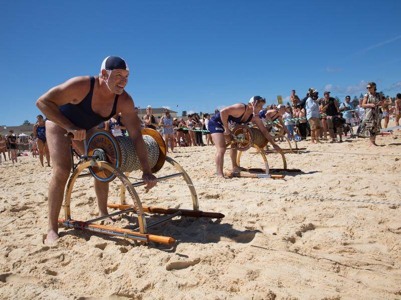 Surf clubs at Bondi have staged a recreation of Australia's largest mass surf rescue in 1938.