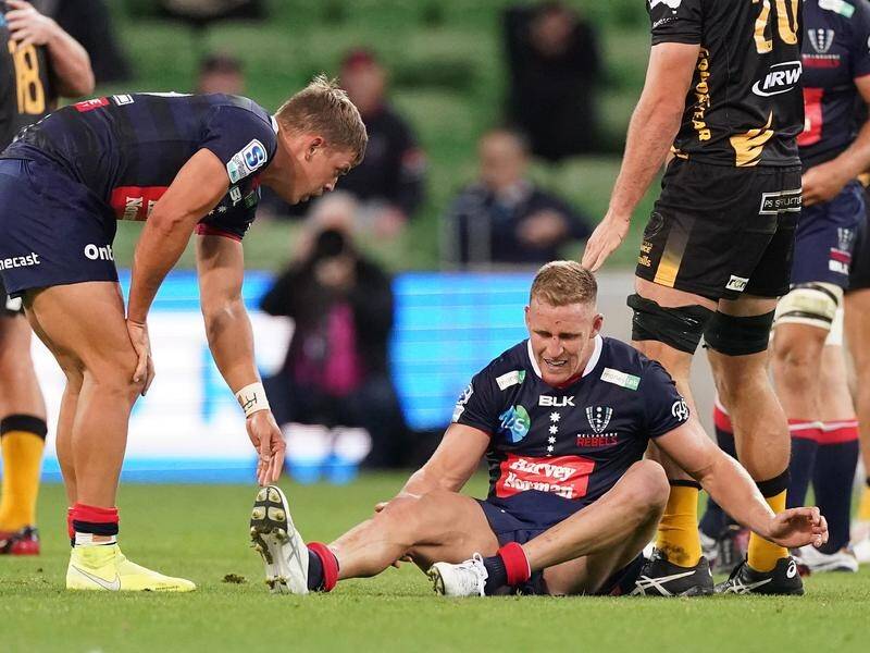 Wallabies star Reece Hodge (r) is out of the remaining Super Rugby season with a knee injury.