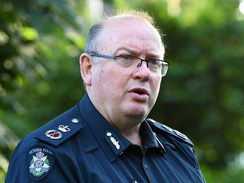 Victoria Police Chief Commissioner Graham Ashton says he might stay on to help tackle COVID-19.
