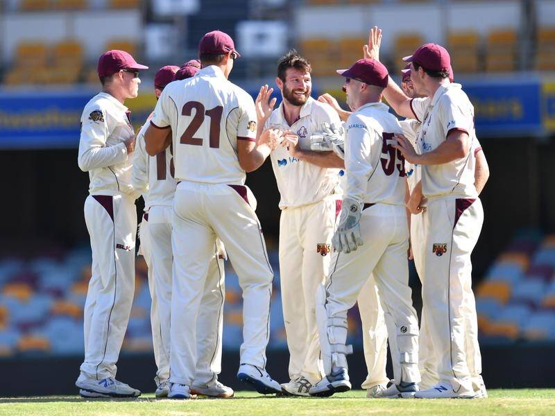 Queensland, led by Michael Neser (C), are ripping through Tasmania's batsmen in their Shield match.
