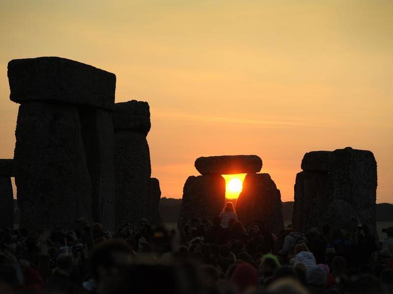 Up to 25,000 people have marked the summer solstice at Britain's Stonehenge.