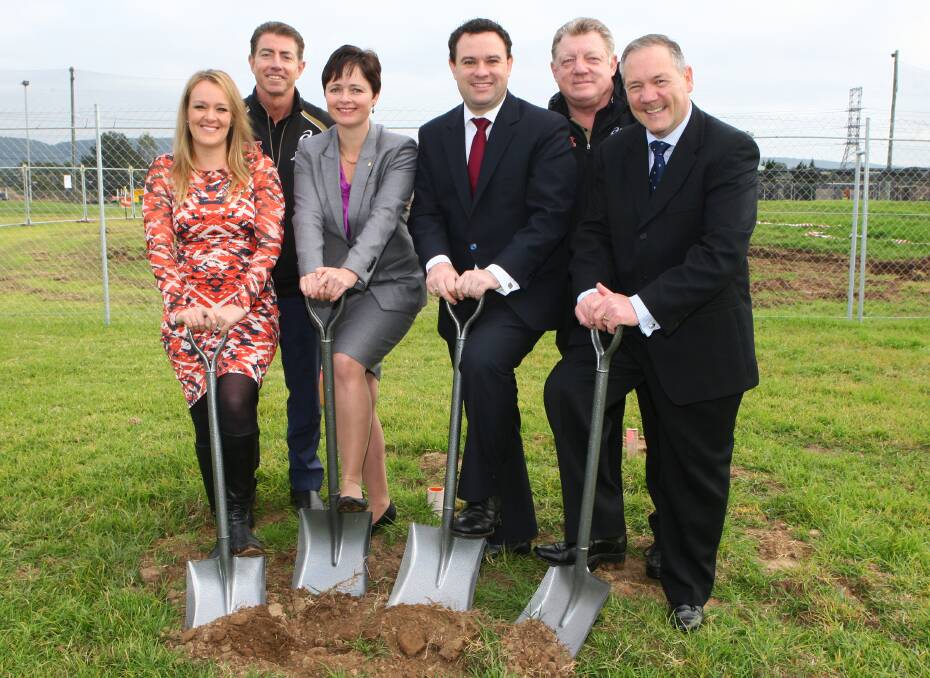 Turning of the sod: MP Fiona Scott, club director Greg Alexander, MP Tanya Davies, Minister for Sport Stuart Ayres, Phil Gould and Panthers Group CEO Warren Wilson break the ground at the site of the academy. Picture: Gary Warrick 
