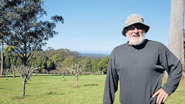John Haitzler has won a bid to get his guns and licence returned to protect his orchard. 