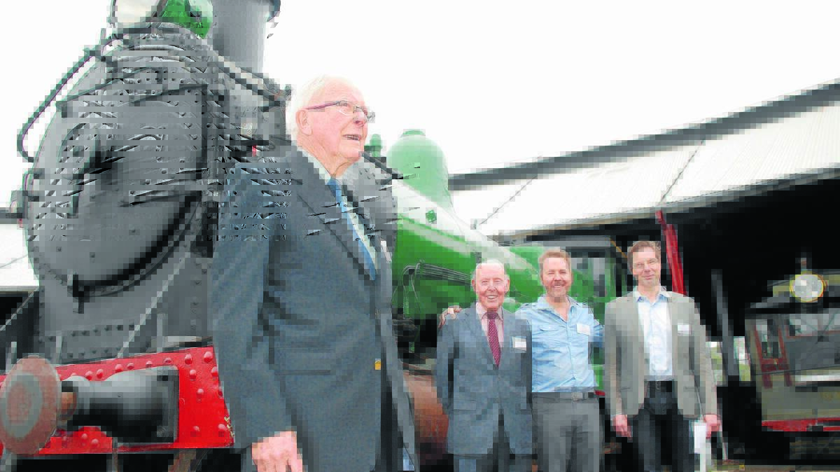 Descendants of one of the early railway men honoured last week. Pictured are Peter Honey, 86 and Stuart Honey, 88, with Stuart’s sons Geoff and Stephen Honey in front of the 3214 which operated during WW1 and has been restored by the volunteers at Valley Heights.