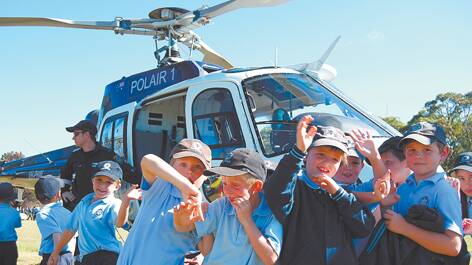 St Thomas Aquinas primary school students got a close look at the visiting Polair helicopter.