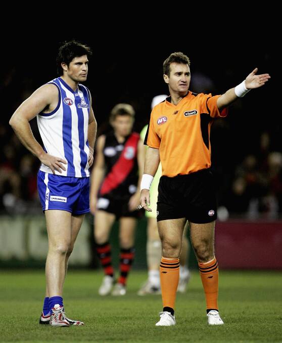 PRESSURE: Former AFL umpire Darren Goldspink, pictured at the height of his career, says new dissent rules are just putting increased pressure on umpire. Picture: Mark Dadswell/Getty Images