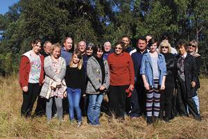 Joining forces: Residents gather at the overgrown Blaxland War Memorial Park last week near where the park's old cricket pitch was located.