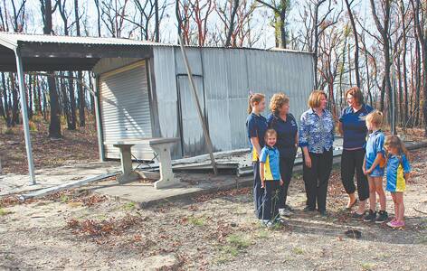 Blue Mountains MP Roza Sage speaks with district leader Dianne Strahan and unit leader Rita Smallwood, along with Amy Smallwood, Annabelle Gibbons, Lila Bishop and Ruby Bishop from Springwood-Winmalee District Girl Guides.