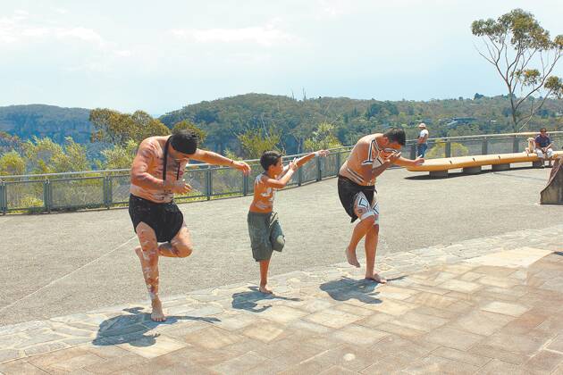Waradah Aboriginal dancers perform at the ceremony to declare the Three Sisters an Aboriginal Place on Sunday.