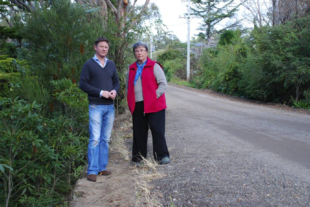 Greens councillor Geordie Williamson and heritage spokeswoman Jan Koperberg are opposed to paving Old Bathurst Road at Woodford, an area they say is a living museum of Australian  history and one of the last three remnants of the road left in the Mountains.