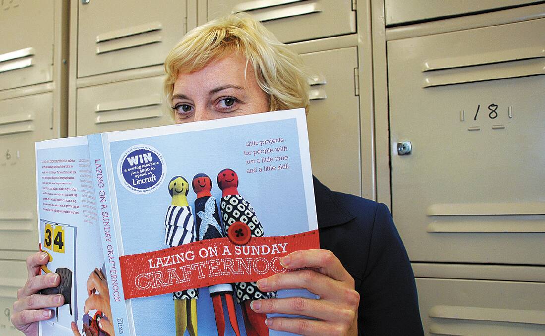 Eliza Muldoon with her first book, Lazing on a Sunday Crafternoon